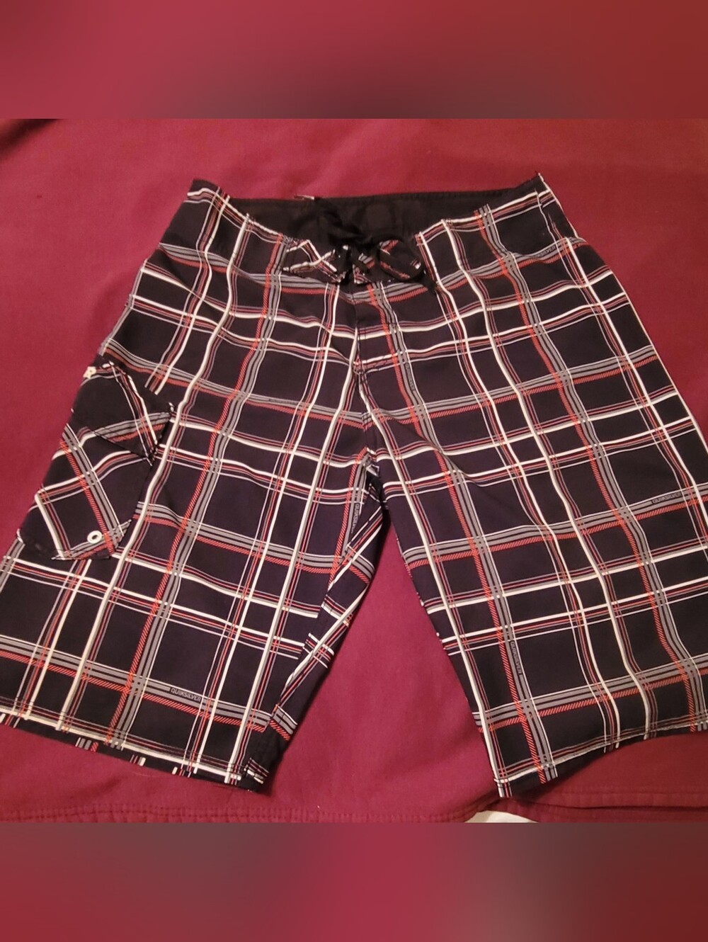 Boys Quiksilver Black Plaid Swim Trunks with Red and White Accents